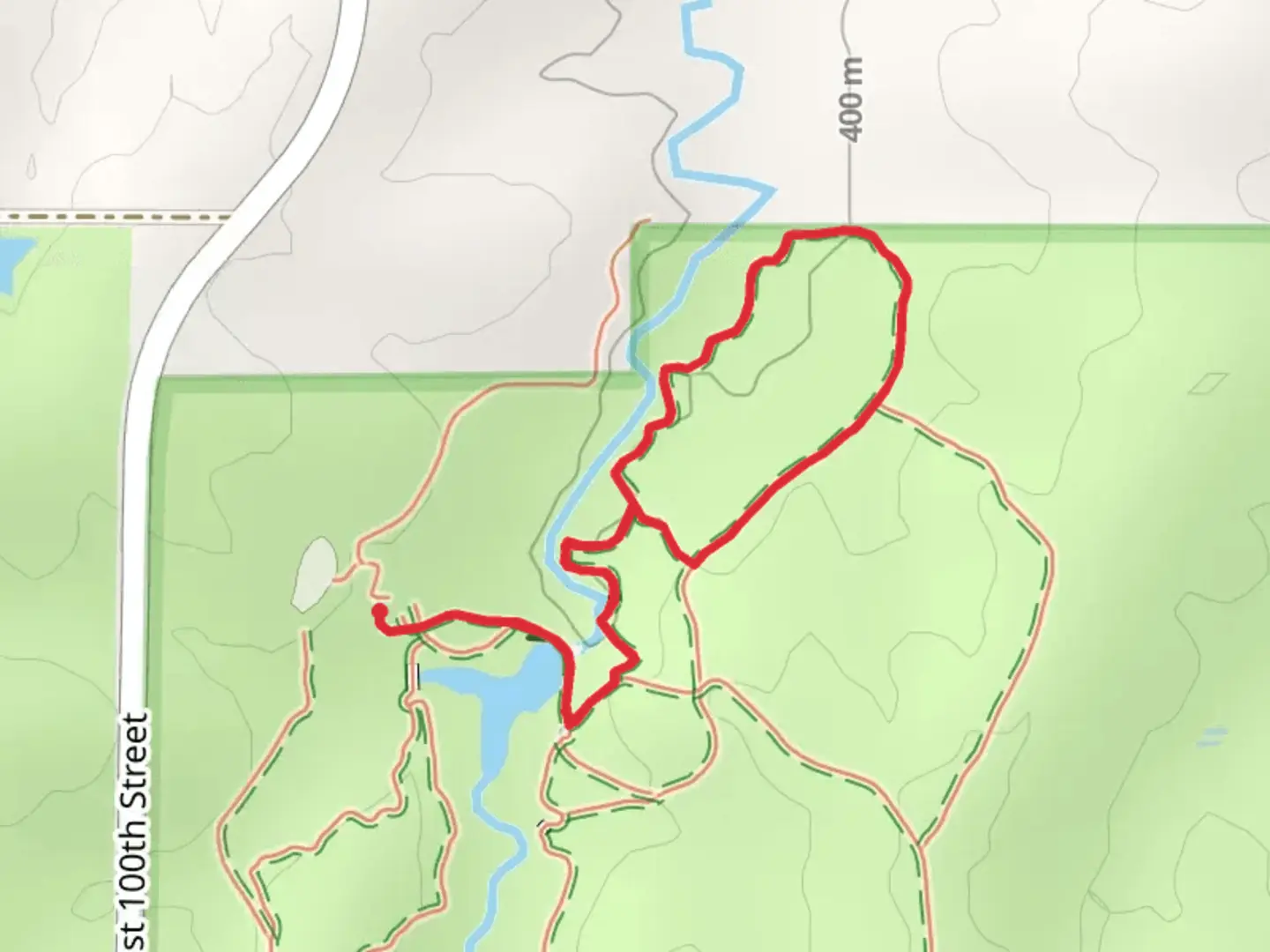 An image depicting the trail Woodland Loop Trail and its surrounding area.