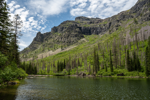 An image depicting the trail Snyder Lake via Gunsight Pass Trail and its surrounding area.