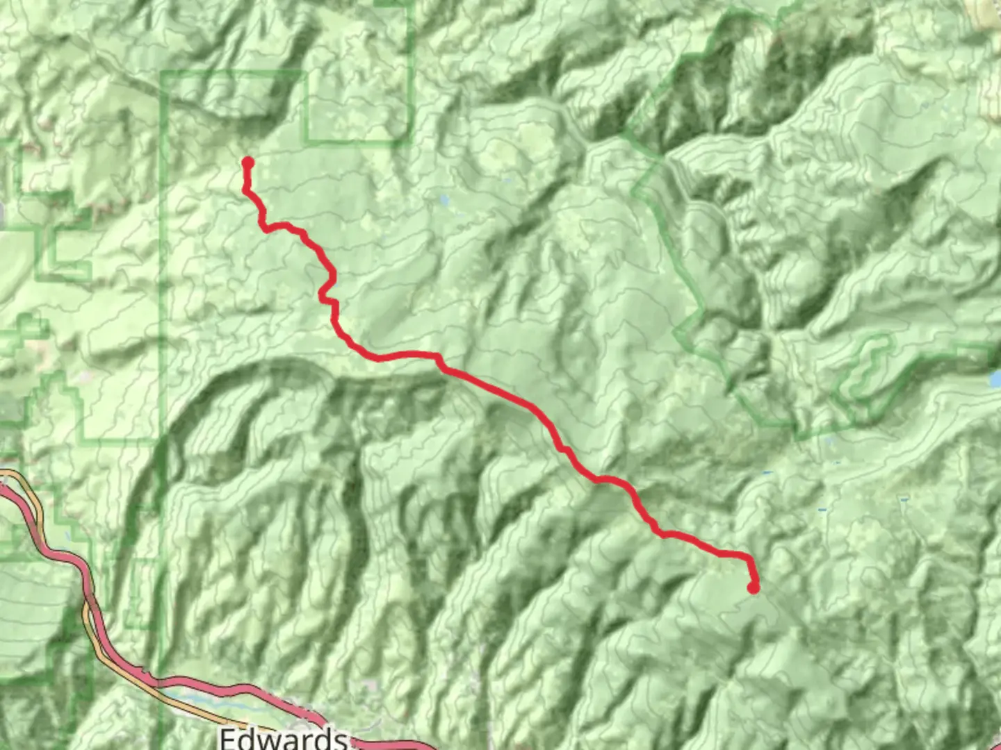 An image depicting the trail Red and White Mountain Road and its surrounding area.