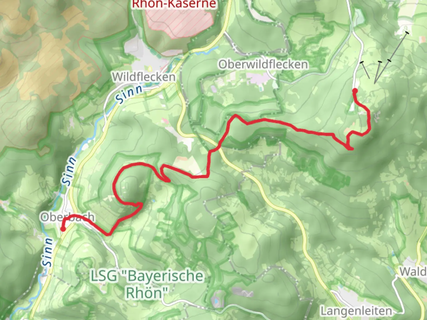 An image depicting the trail Kreuzberg to Oberbach via Rhoen Hoehenweg and its surrounding area.