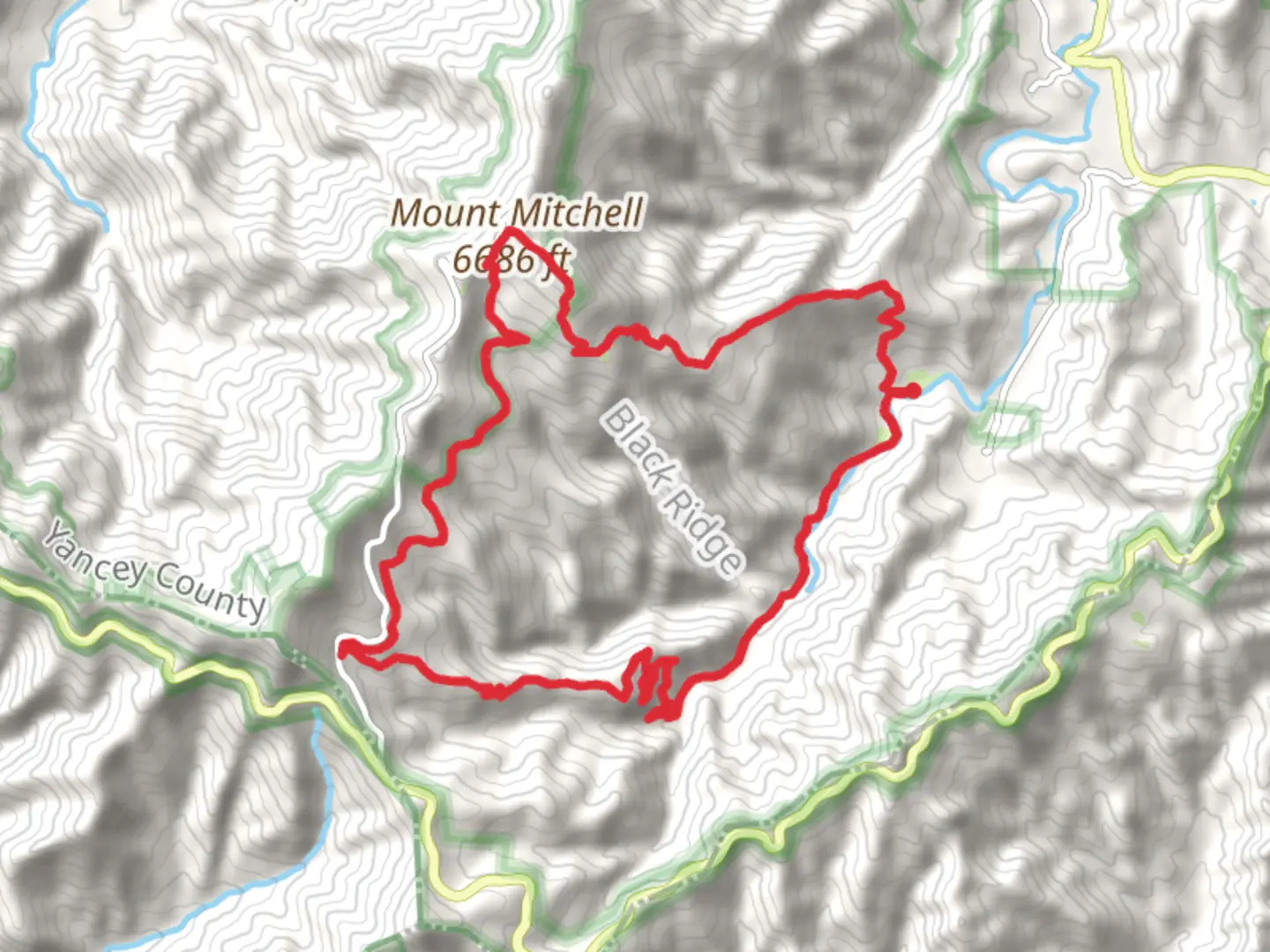 An image depicting the trail Mount Mitchell and Chestnut Knob Loop and its surrounding area.