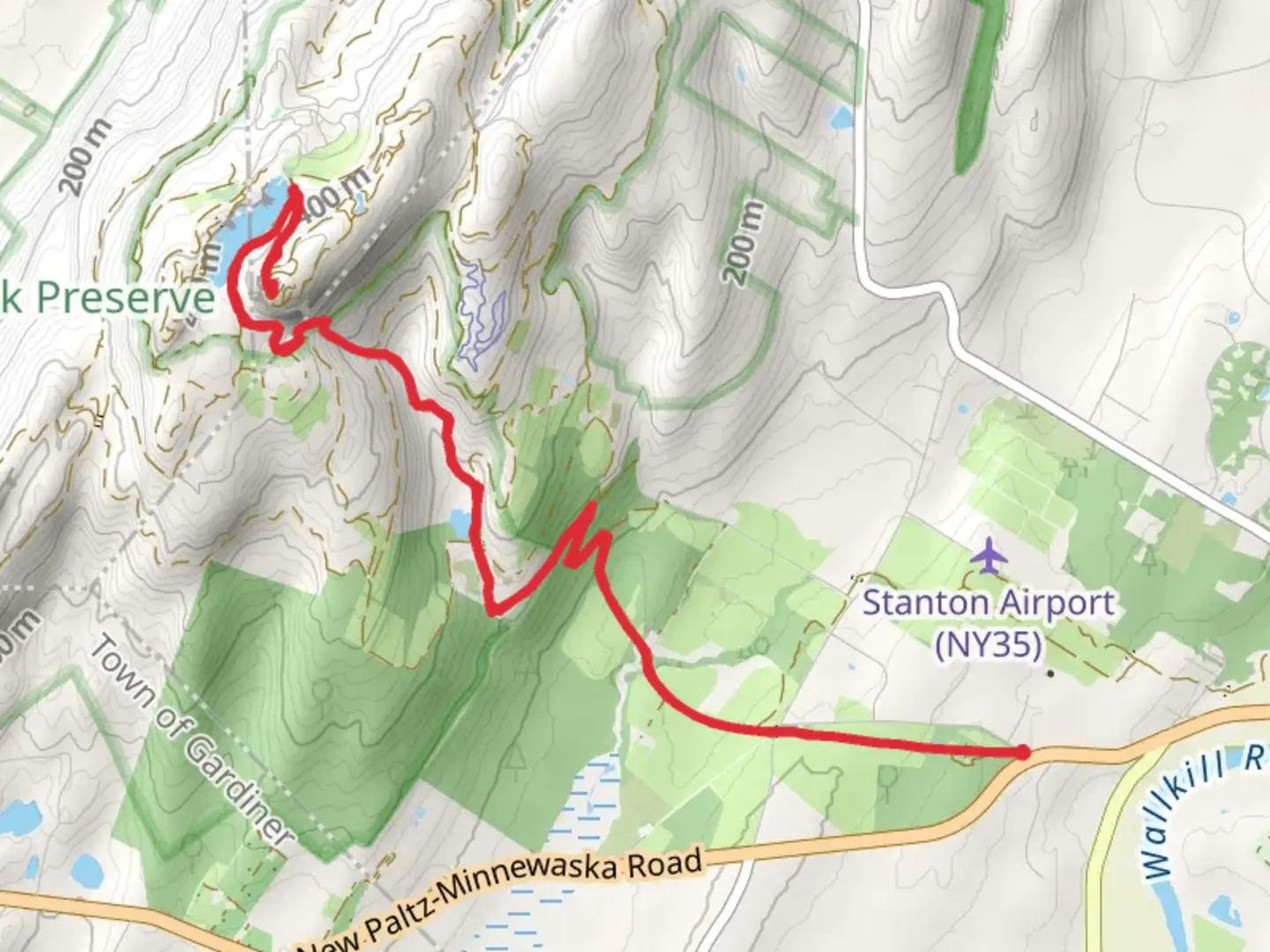 An image depicting the trail Skytop Reservoir via Mohonk Lake Trail and its surrounding area.