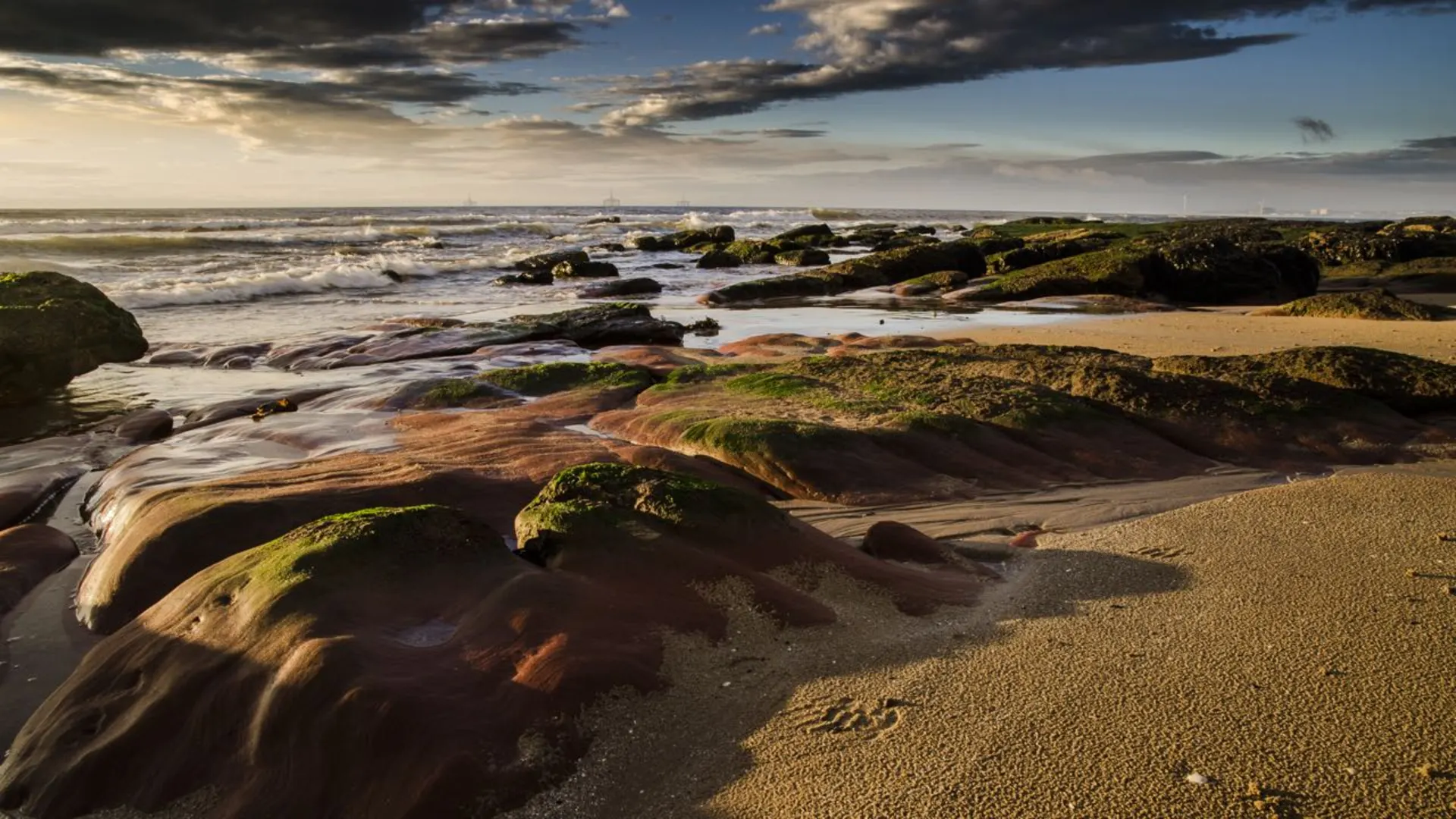 An image depicting the trail Fife Coastal Path and its surrounding area.