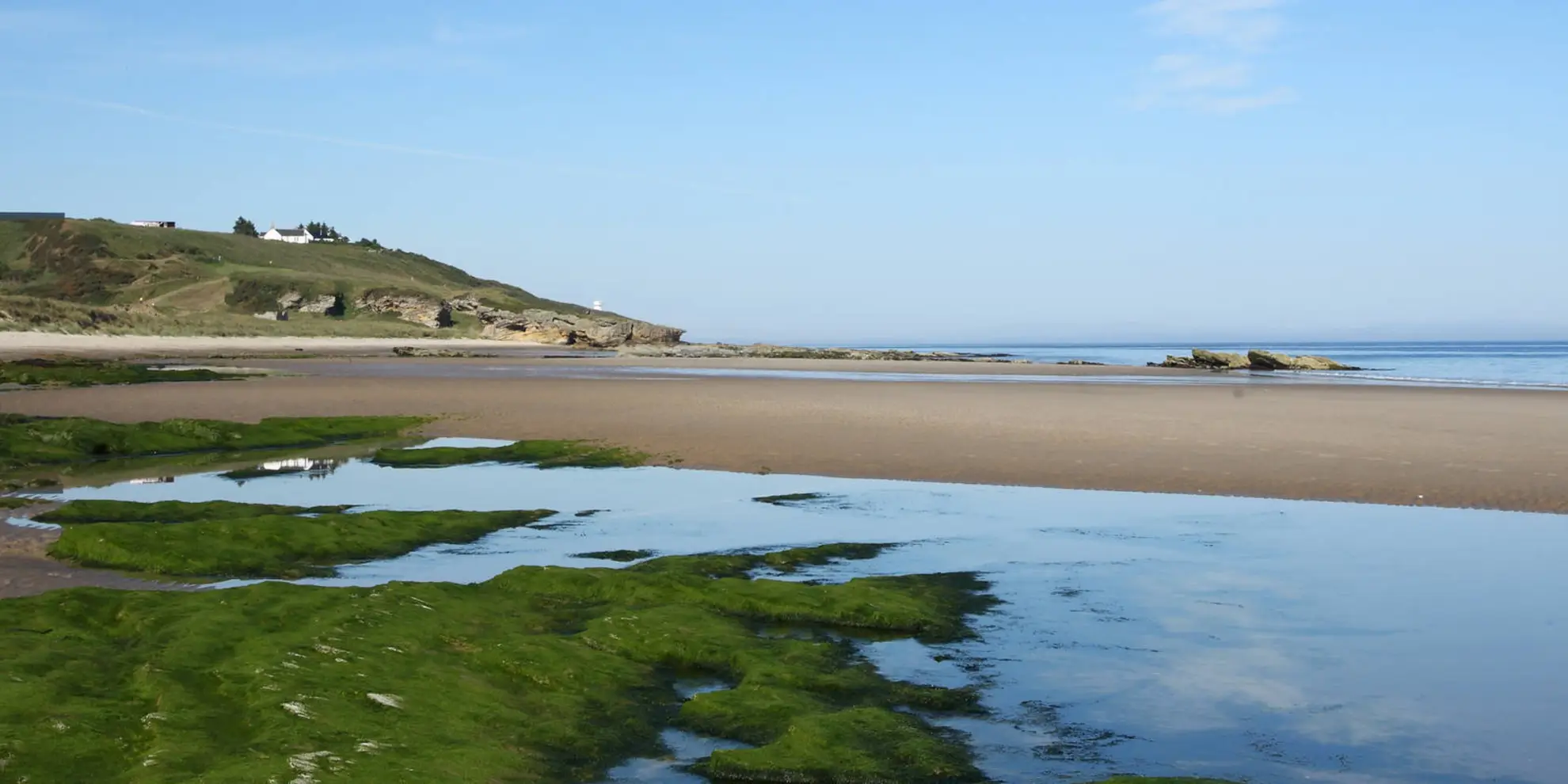 An image depicting the trail Hopeman to Lossiemouth via Moray Coast Trail and its surrounding area.