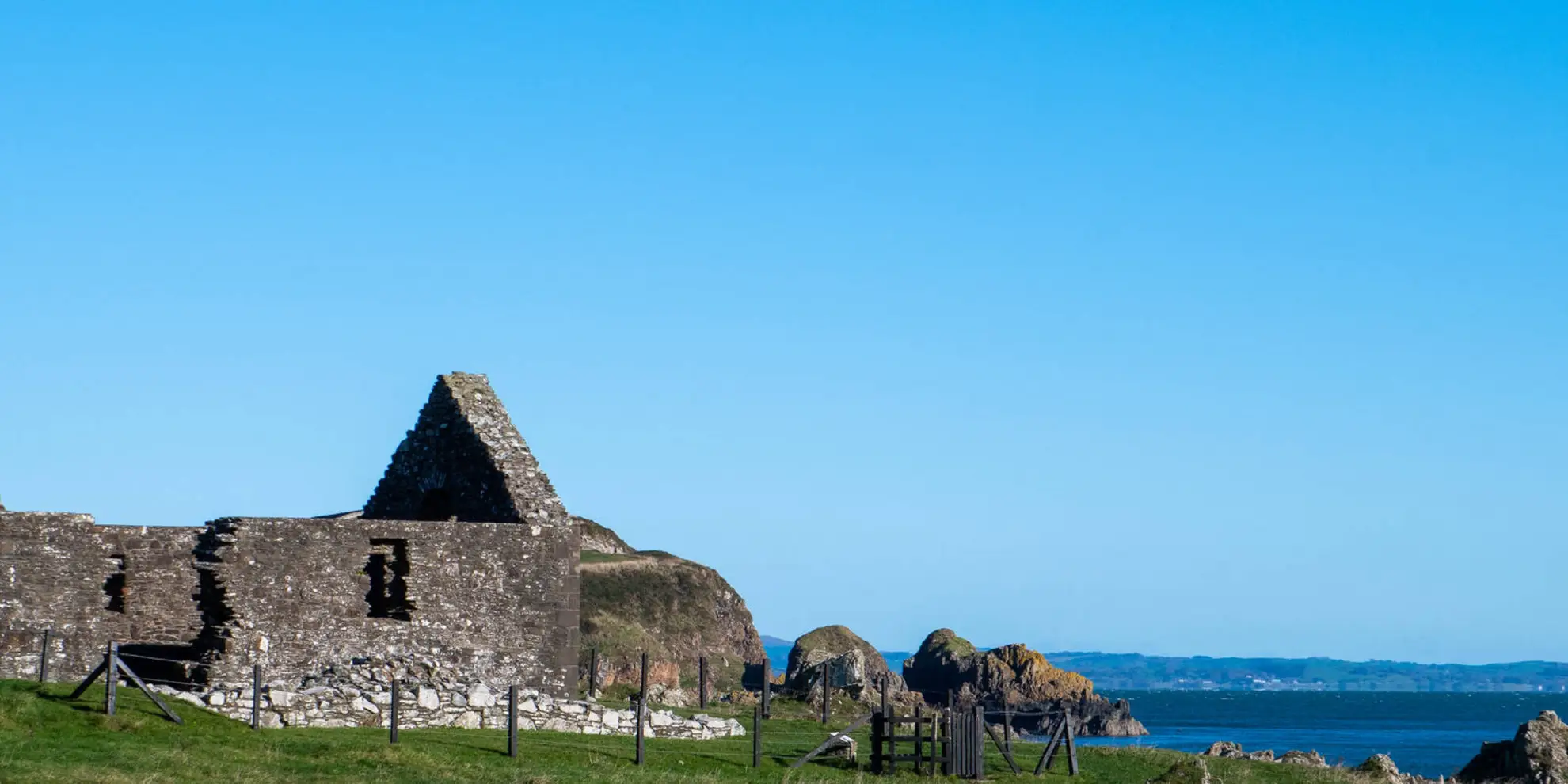 An image depicting the trail Isle of Whithorn to Port Castel Bay via St Ninian's Cave and its surrounding area.