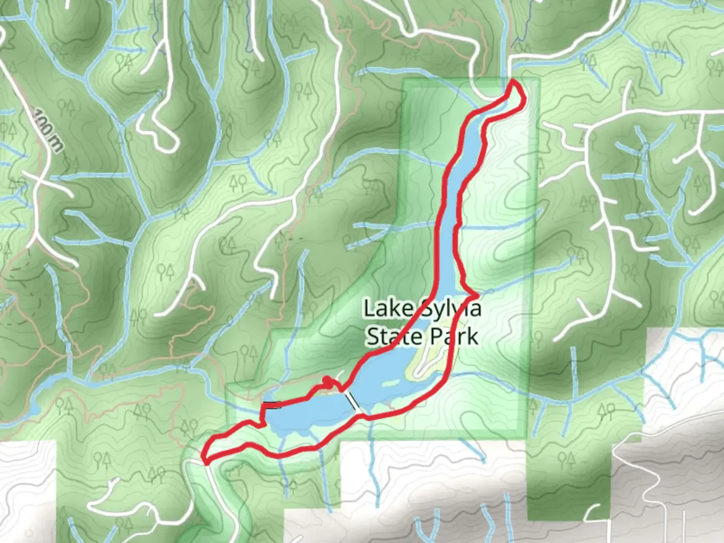An image depicting the trail Sylvia Creek Forestrey Trail and Lake Sylvia State Park and its surrounding area.