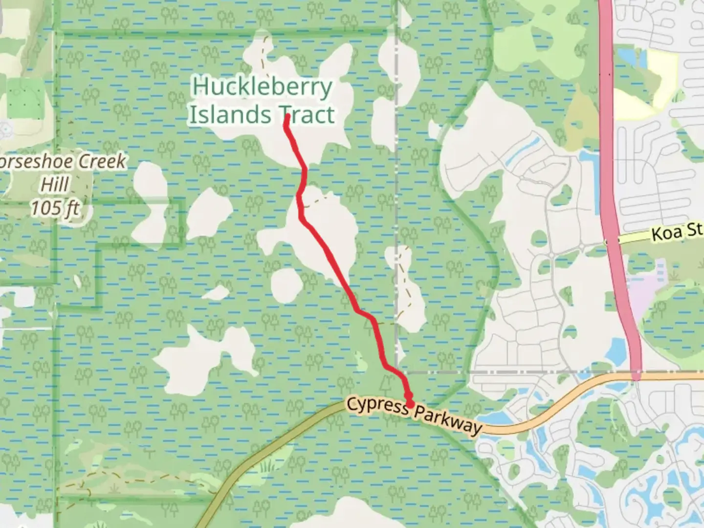 An image depicting the trail Huckleberry Island and its surrounding area.
