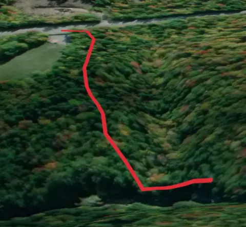 An image depicting the trail Houston Brook Falls from Pleasant Ridge Road and its surrounding area.