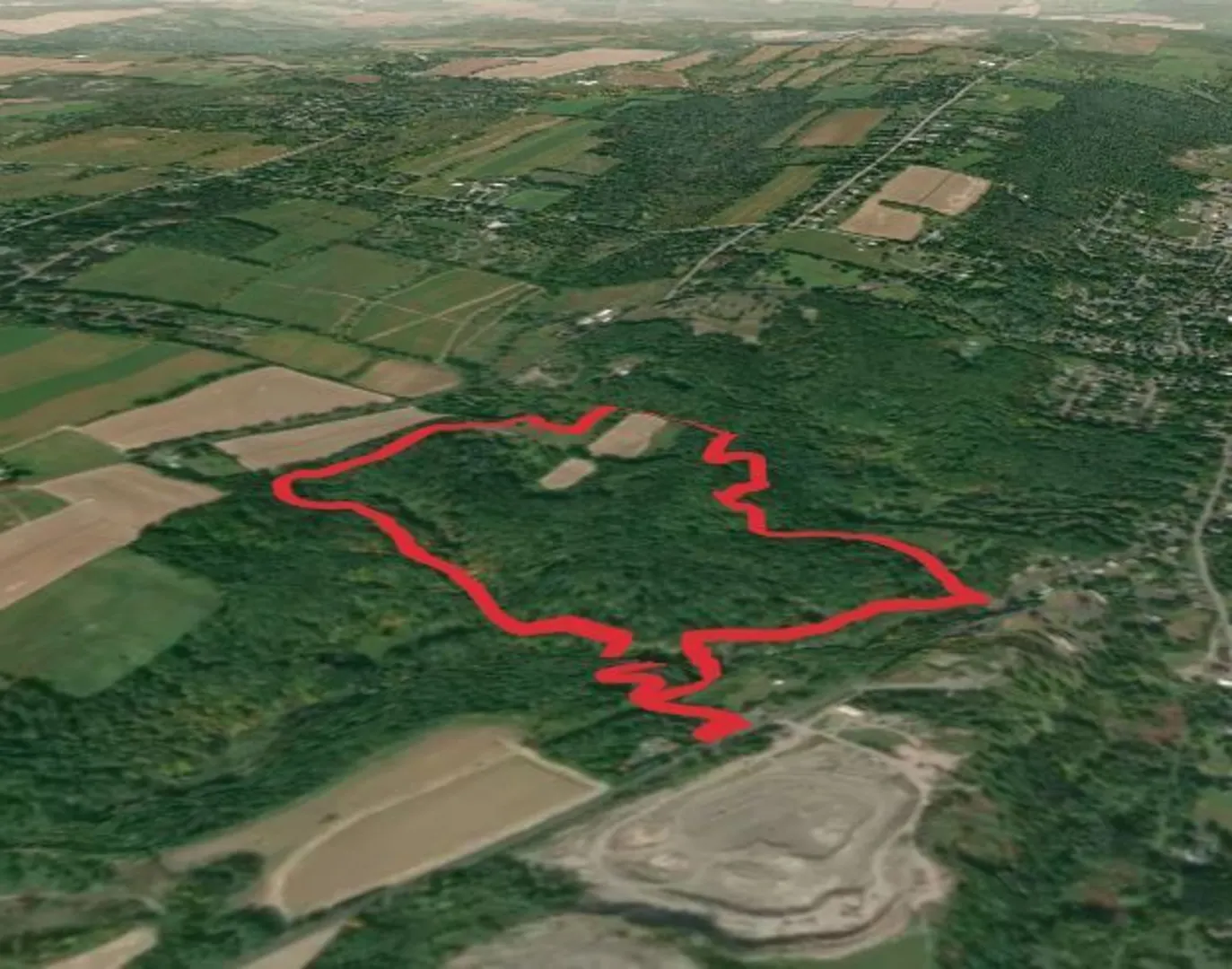 An image depicting the trail Boundary Trail Loop via Arboretum Trail and its surrounding area.