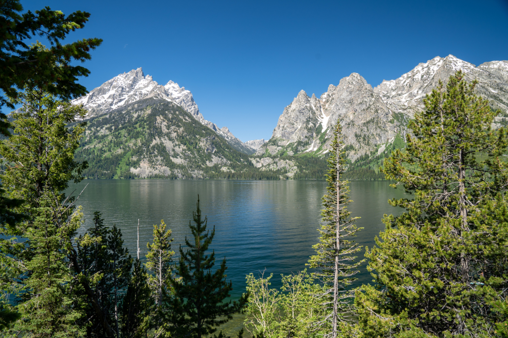 An image depicting the trail Hanging Canyon to Lake of the Crags and its surrounding area.