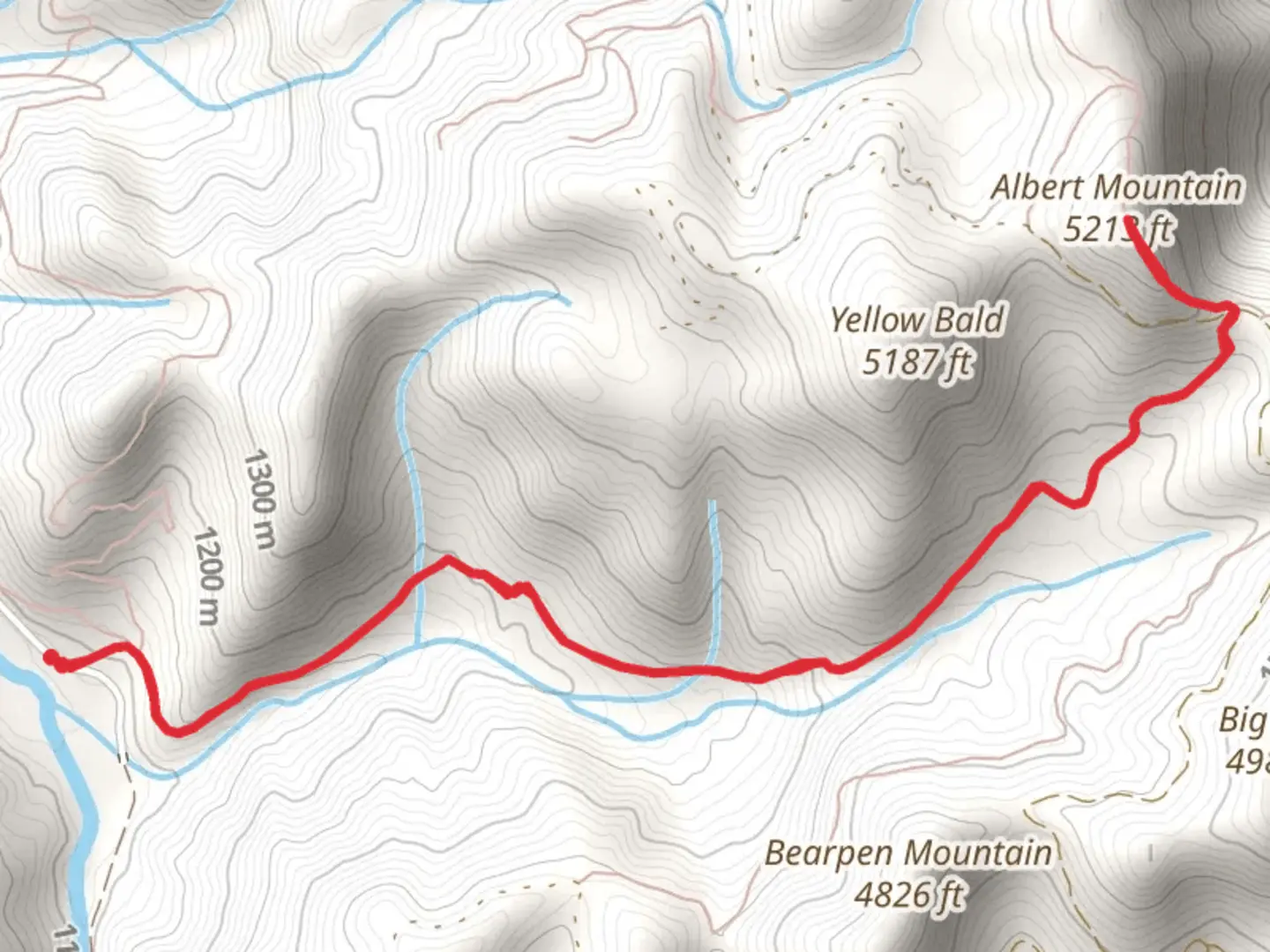 An image depicting the trail Albert Mountain via Bear Pen Gap Trail and its surrounding area.