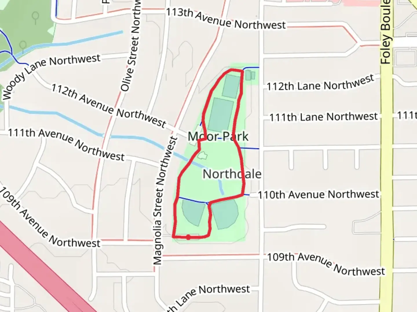 An image depicting the trail Moor Park Path Loop and its surrounding area.