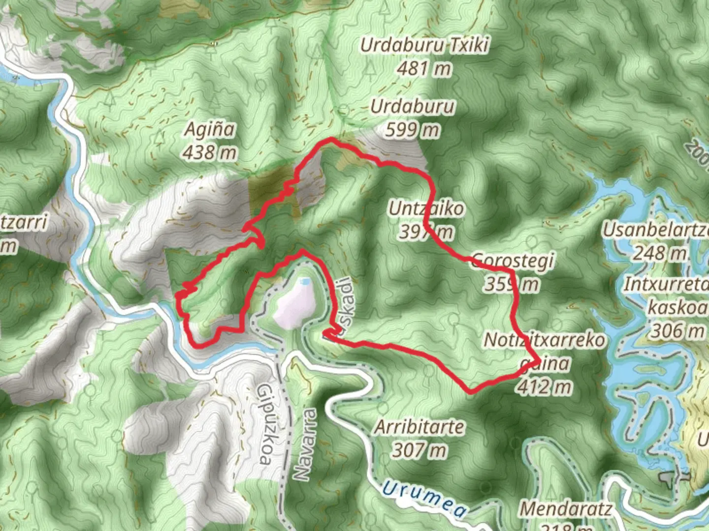 An image depicting the trail Ugaldetxo Forests PR GI 1001 and its surrounding area.