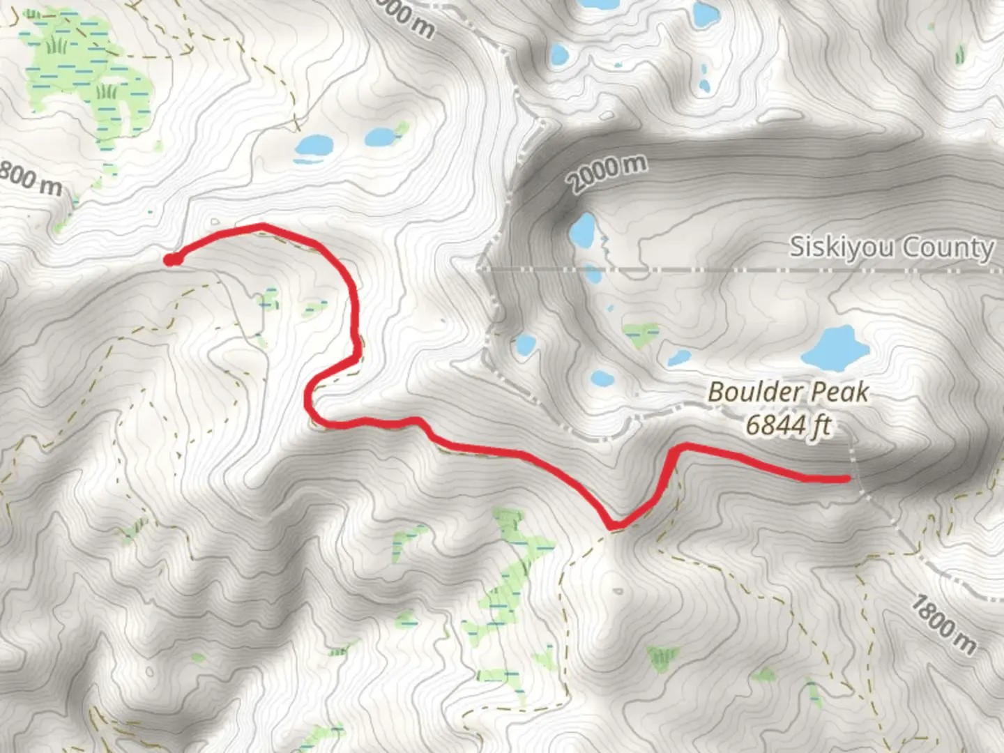 An image depicting the trail Walk beside Boulder Peak and its surrounding area.