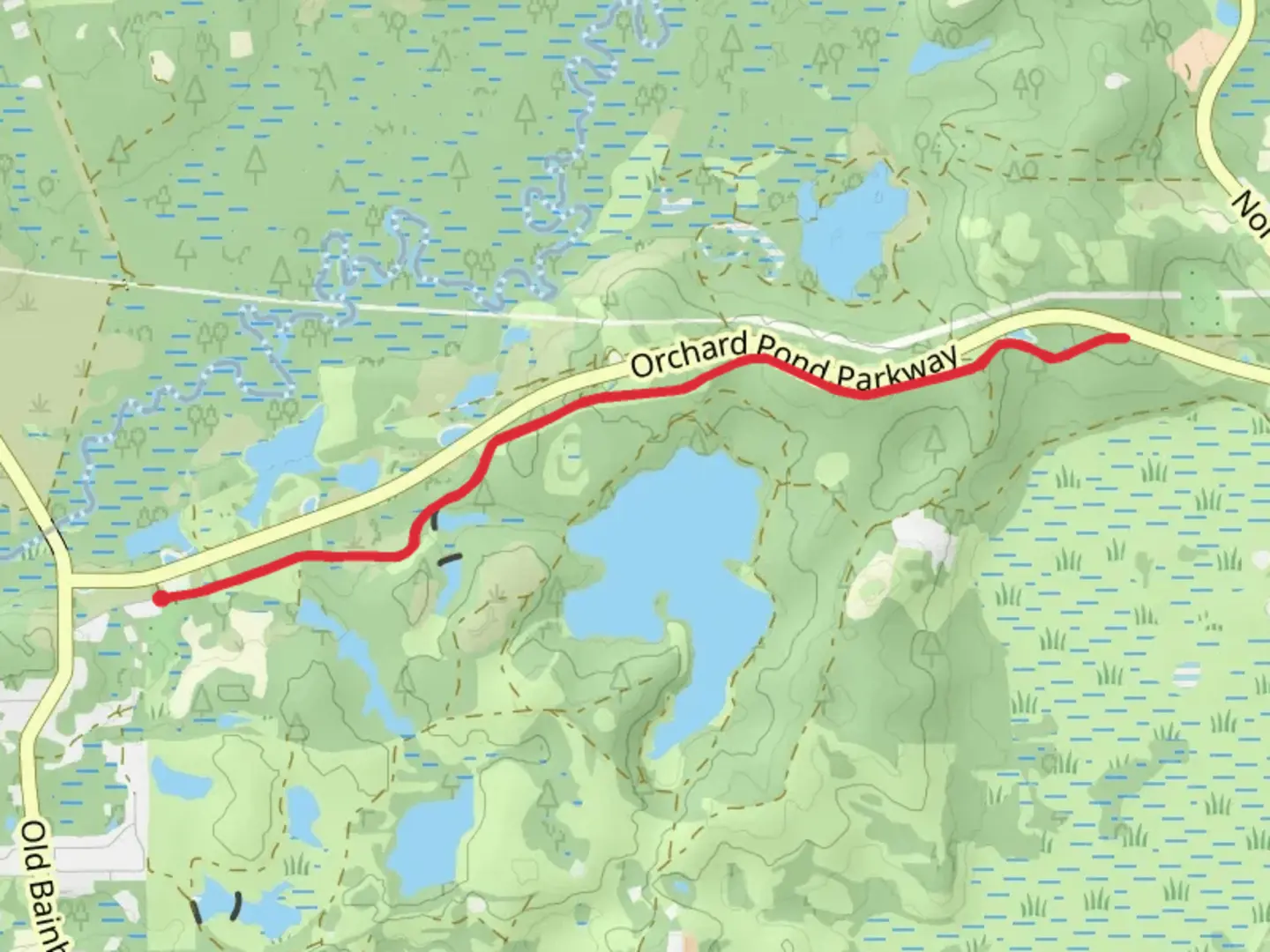 An image depicting the trail Orchard Pond Greenway and its surrounding area.