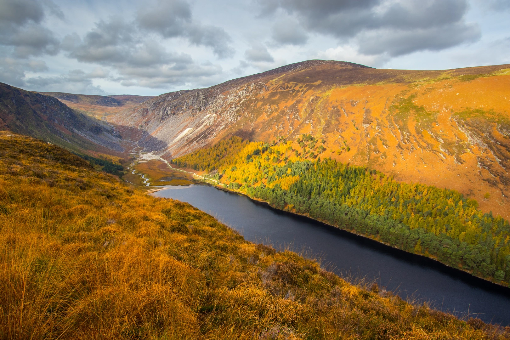 An image depicting the trail Glendalough Red Route and its surrounding area.