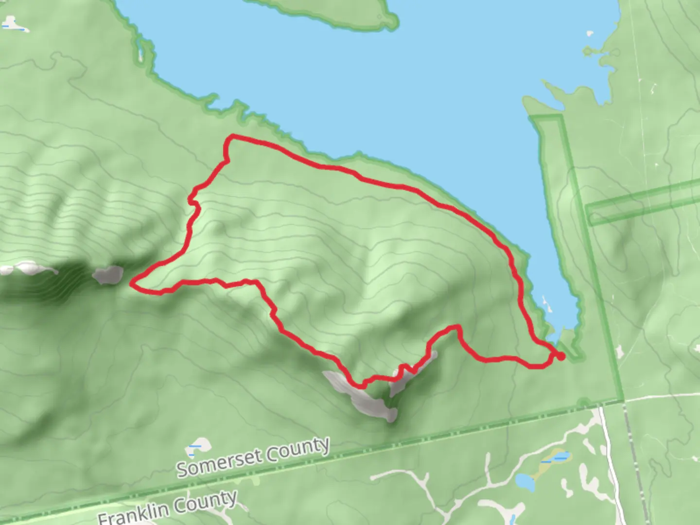 An image depicting the trail Little Bigelow Mountain via Chase Brook and Dead River and its surrounding area.