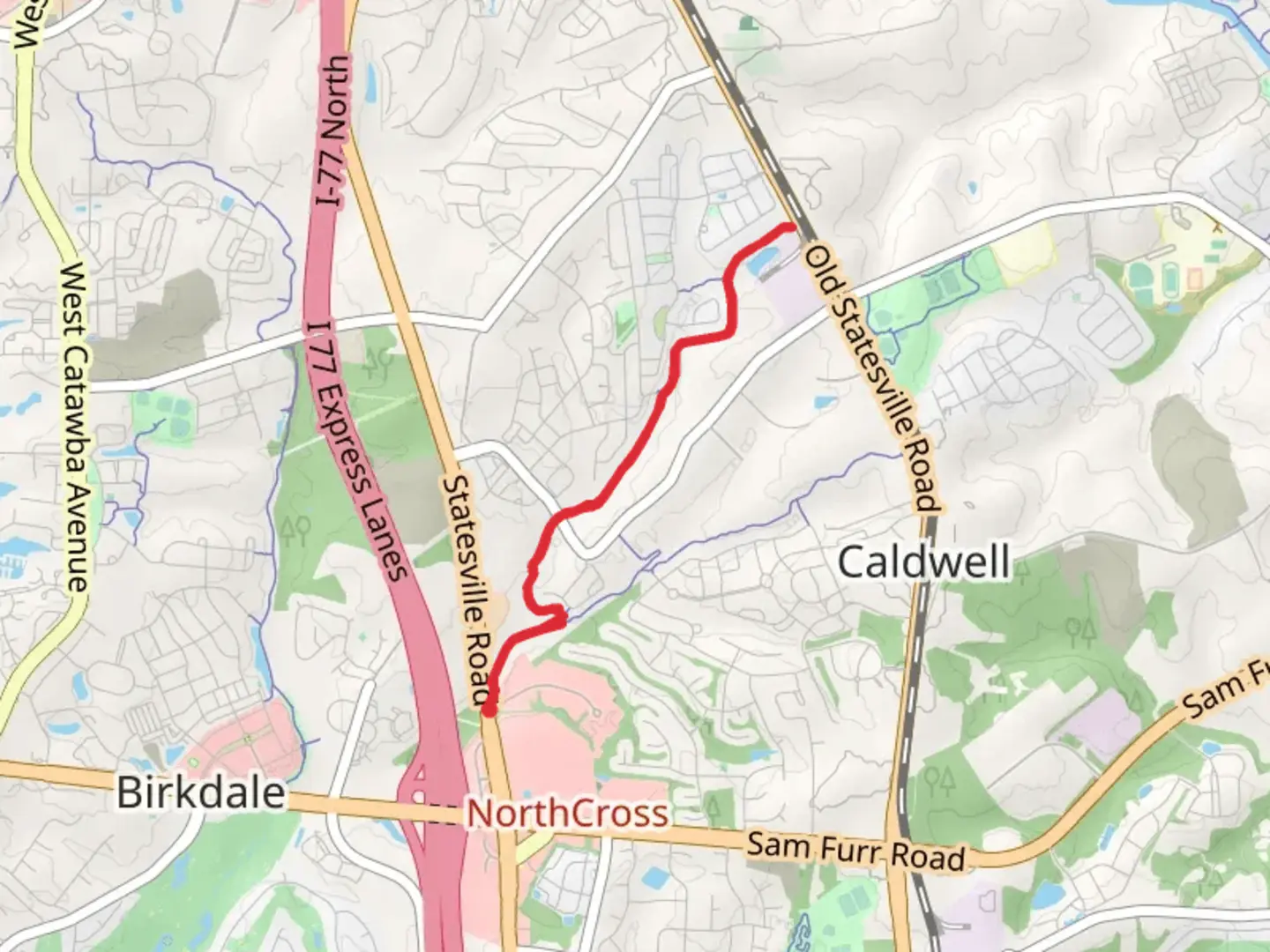 An image depicting the trail Caldwell Station Creek Greenway and its surrounding area.