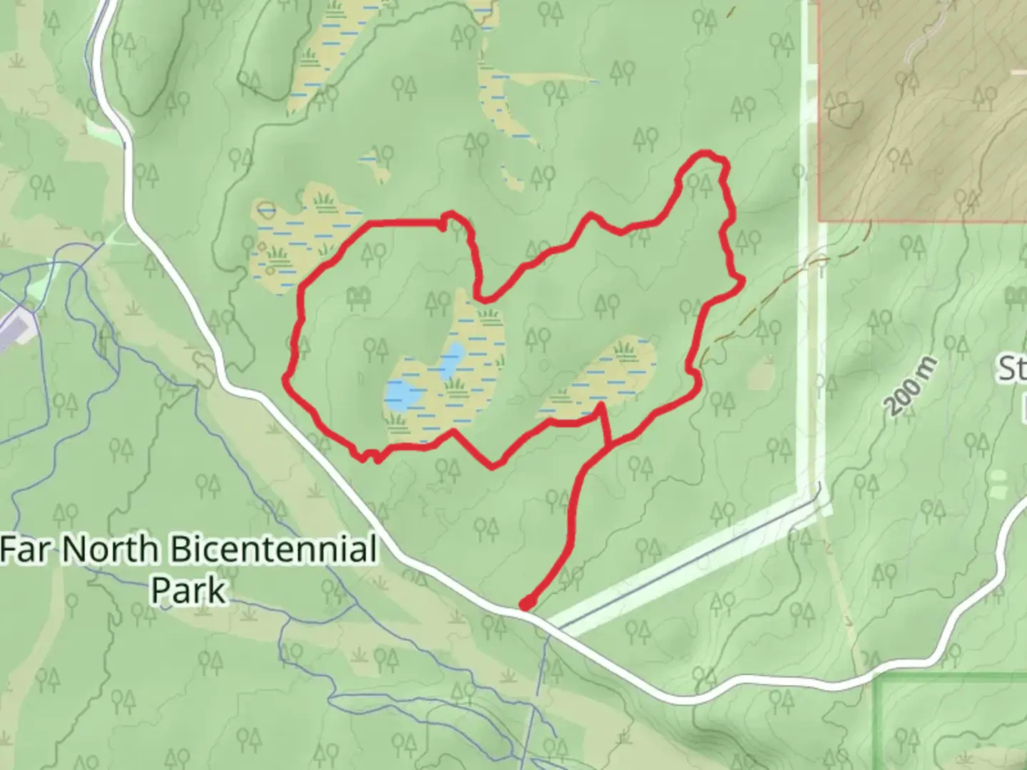 An image depicting the trail Far North Bicentennial Park Short North Loop from Basher Drive and its surrounding area.