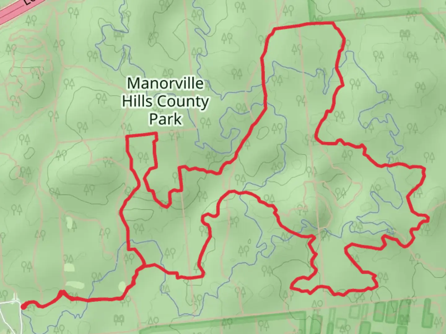 An image depicting the trail Paumanok Path - Manorville Hills County Park and its surrounding area.