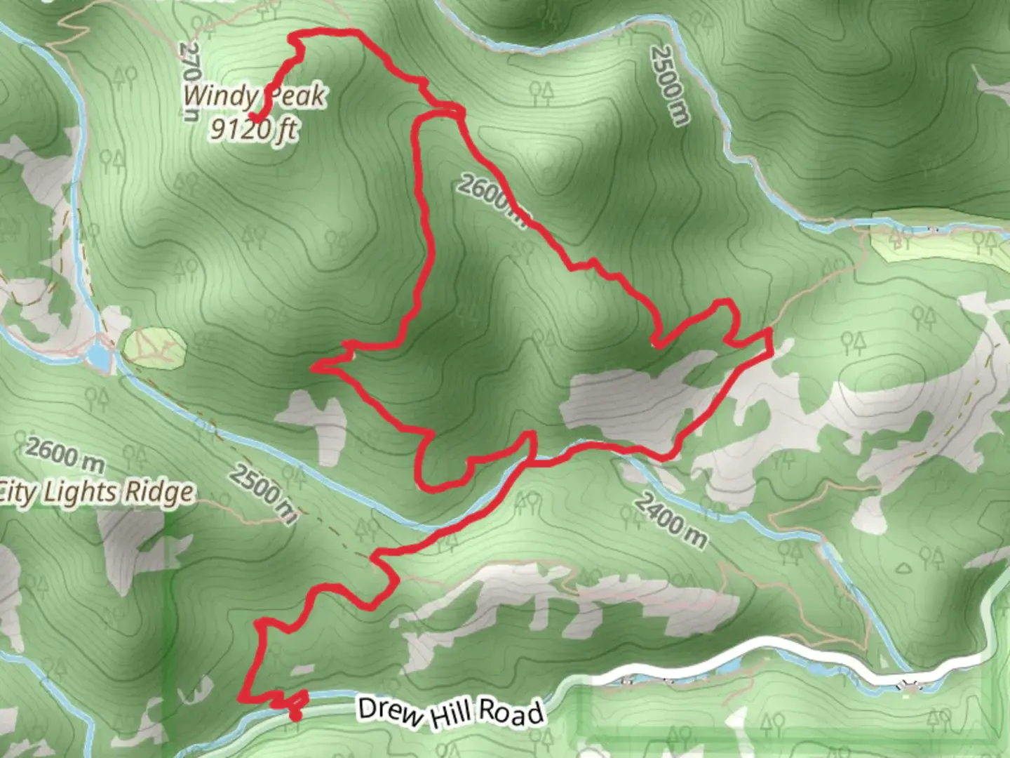 An image depicting the trail Windy Peak via Burro Loop Trail and its surrounding area.