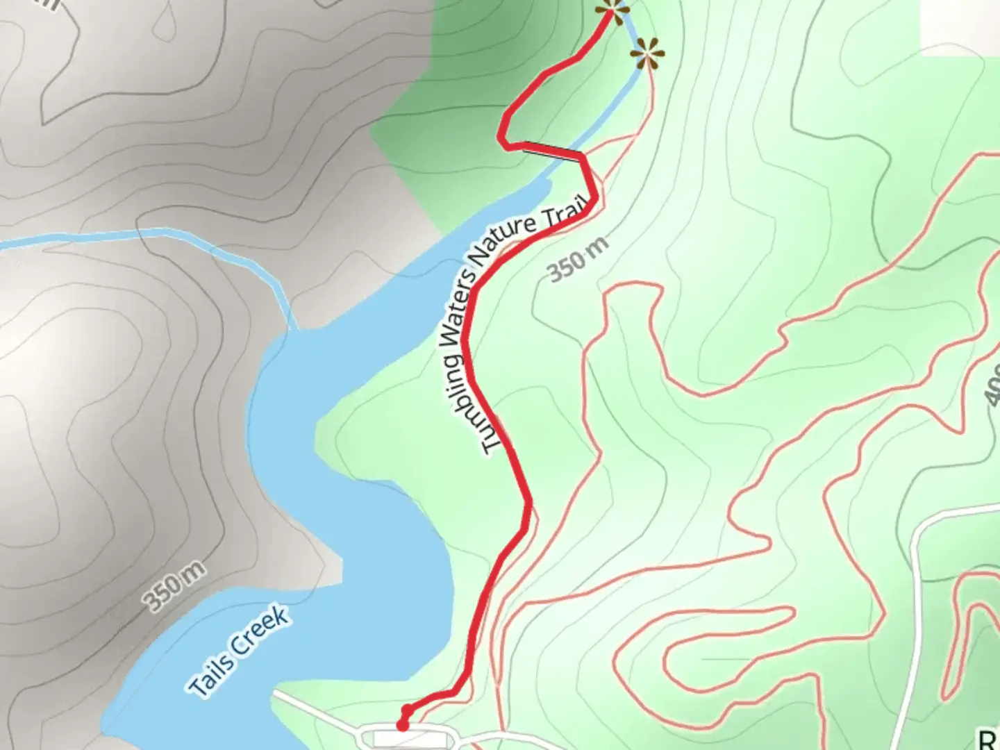 An image depicting the trail Tumbling Waters Nature Trail and its surrounding area.