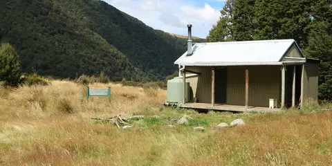 An image depicting the trail Dunrobin Valley Road to Aparima Hut and its surrounding area.