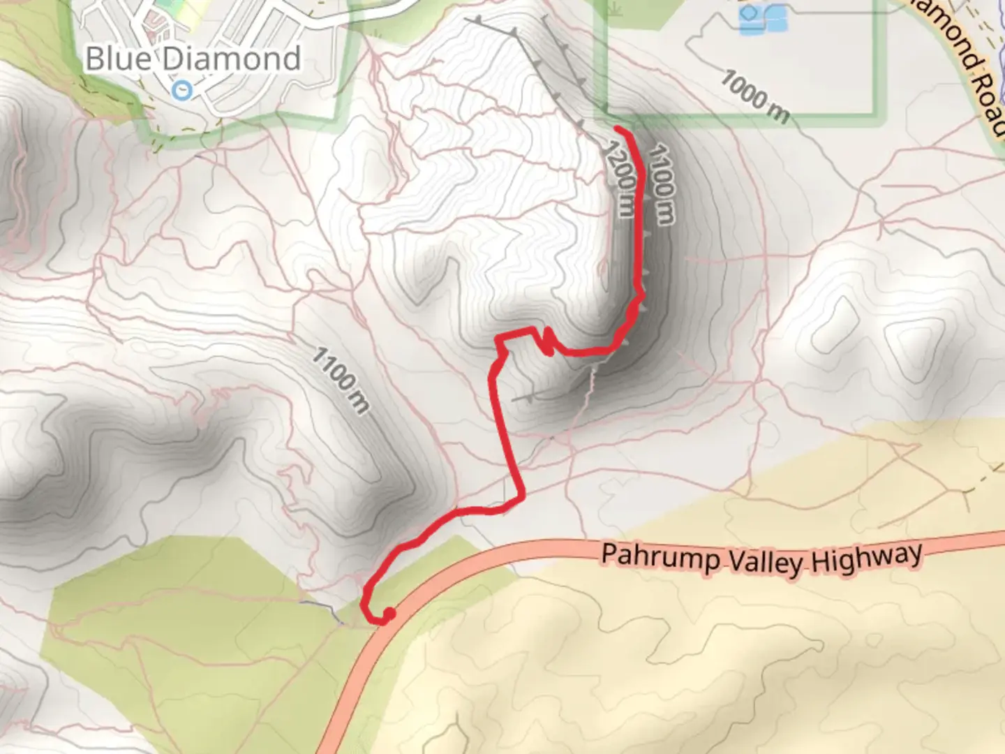 An image depicting the trail Old Spanish Trail from Pahrump Valley Road and its surrounding area.