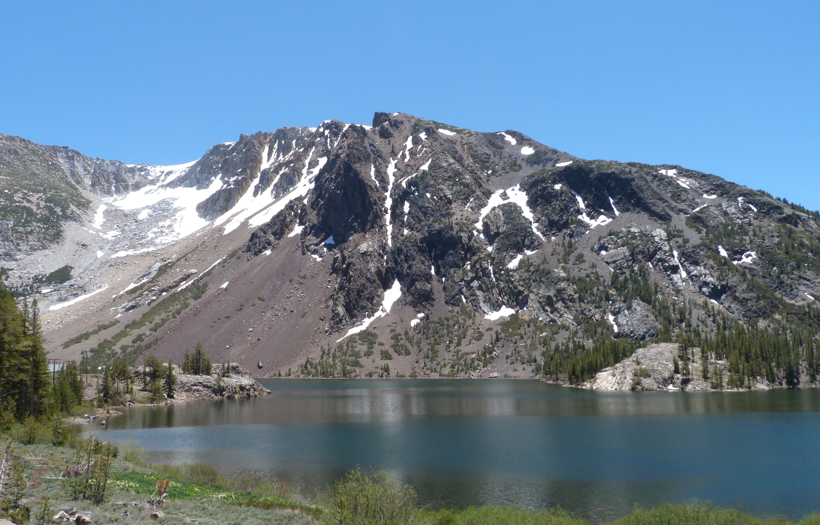 An image depicting the trail Shell , Fantail and Spuller Lake via Bennetville Loop Trail and its surrounding area.