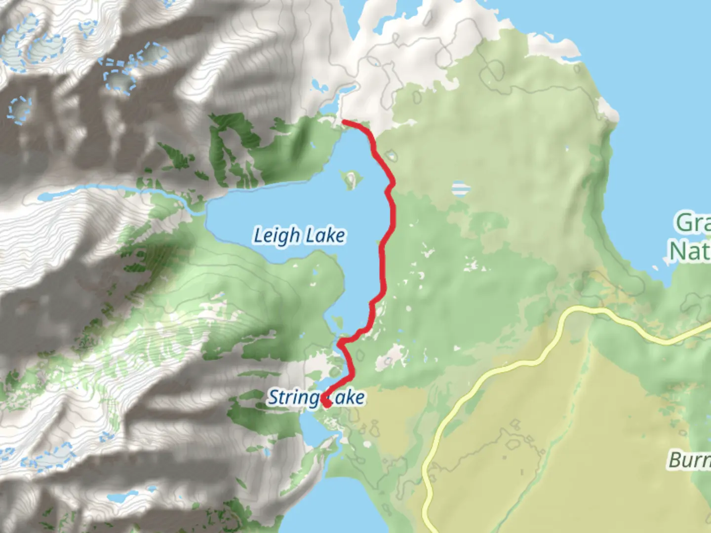 An image depicting the trail Walk beside Leigh Lake and its surrounding area.