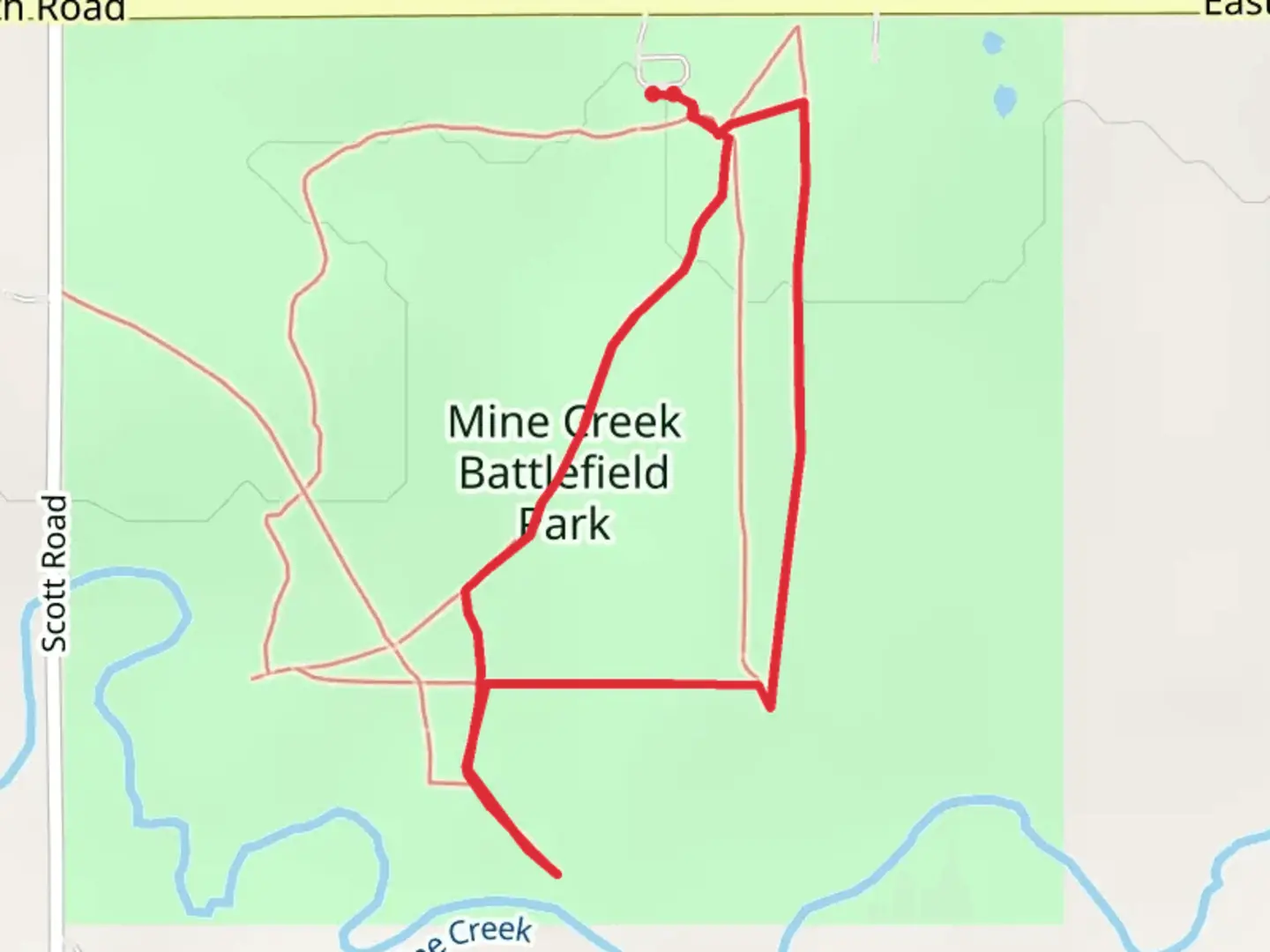 An image depicting the trail Mine Creek Battlefield Park Loop and its surrounding area.