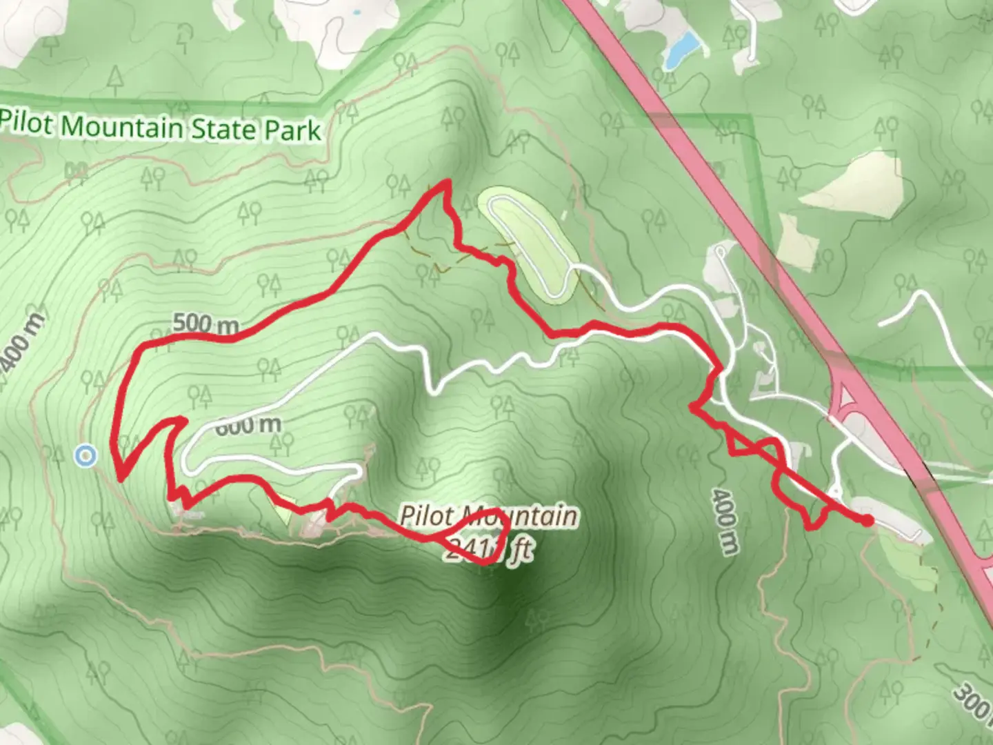 An image depicting the trail Pilot Mountain via Grindstone Trail and its surrounding area.