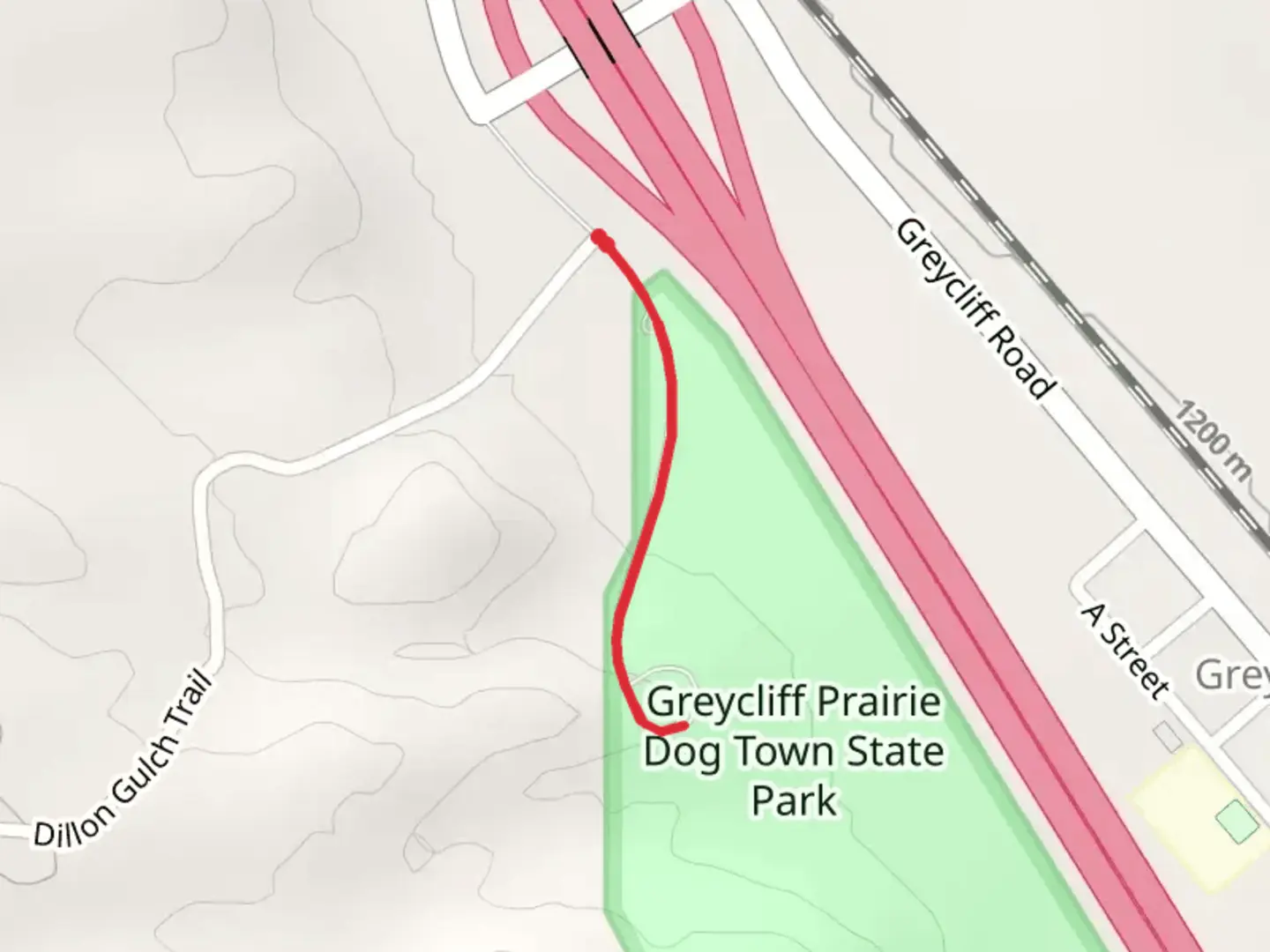 An image depicting the trail Greycliff Prairie Dog Town State Park and its surrounding area.