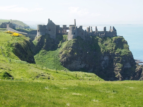 An image depicting the trail Dunluce Castle and its surrounding area.
