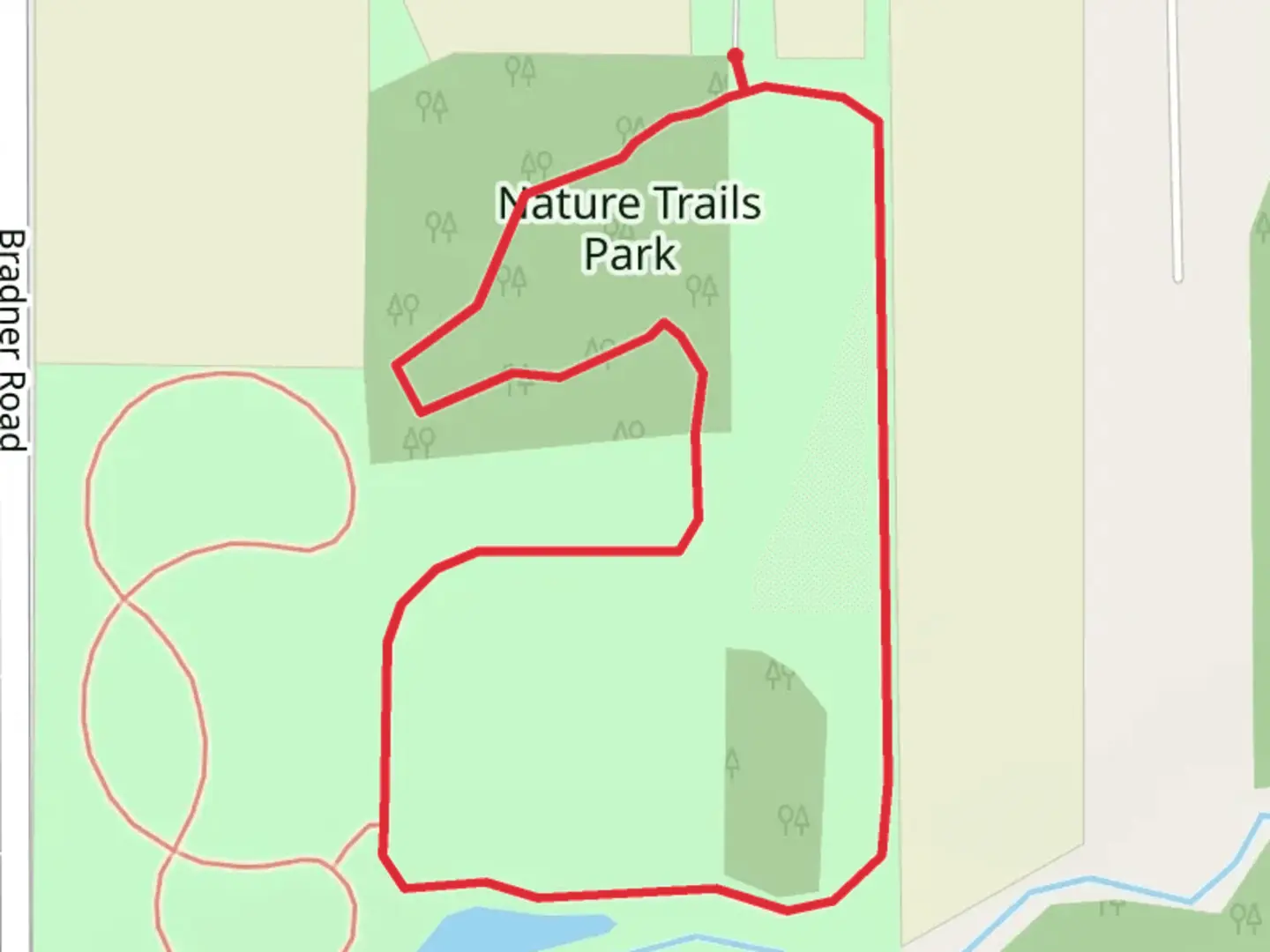 An image depicting the trail Nature Trails Park Loop and its surrounding area.