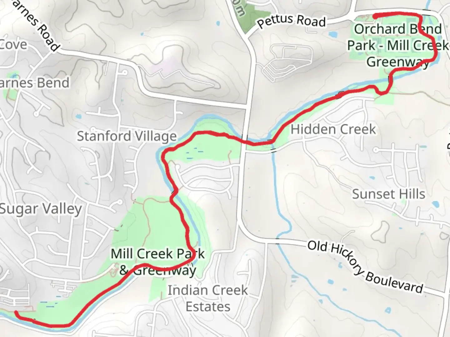 An image depicting the trail Mill Creek Greenway and its surrounding area.