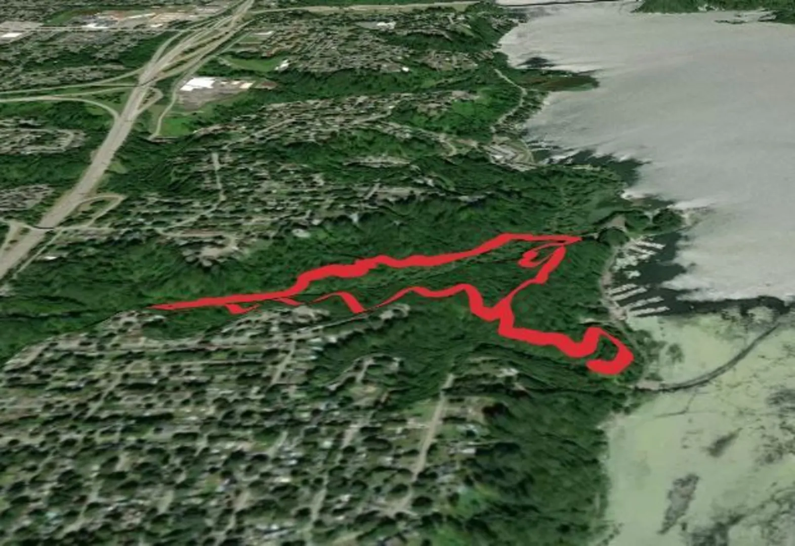 An image depicting the trail Irondequoit Bay Park West Loop from Orchard Park Boulevard and its surrounding area.