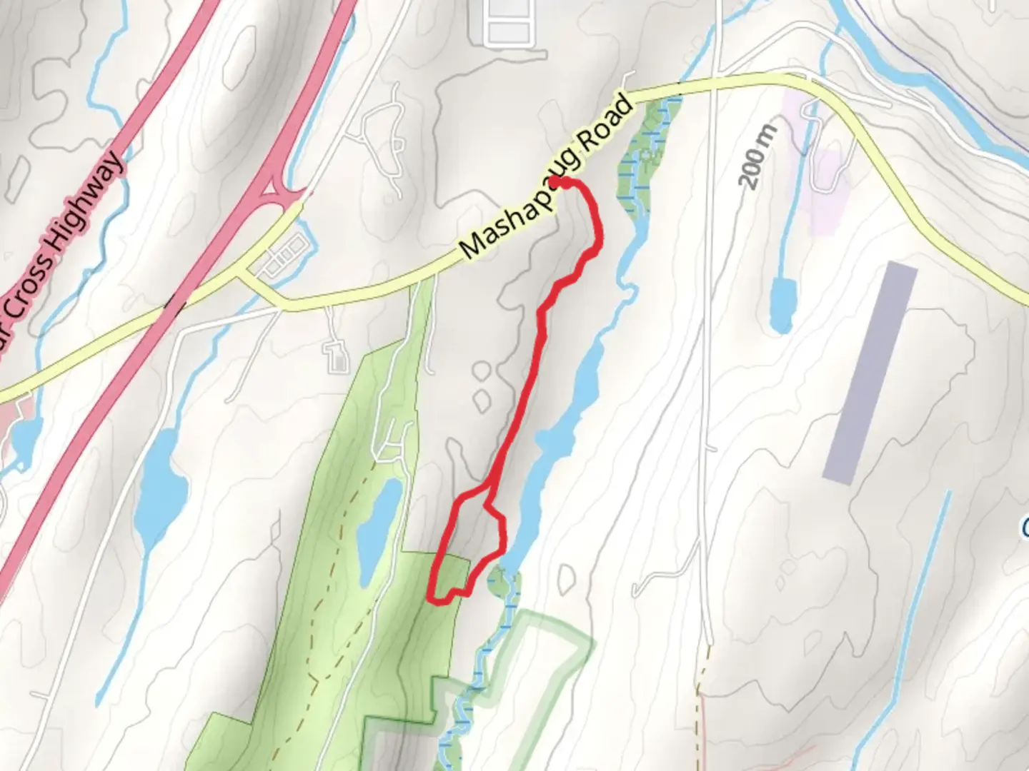 An image depicting the trail Breakneck Brook from Mashapaug Road and its surrounding area.