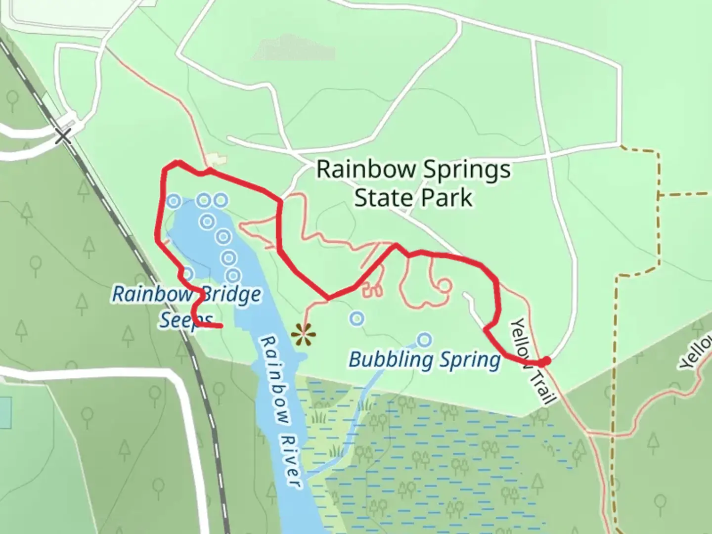 An image depicting the trail Rainbow River and its surrounding area.