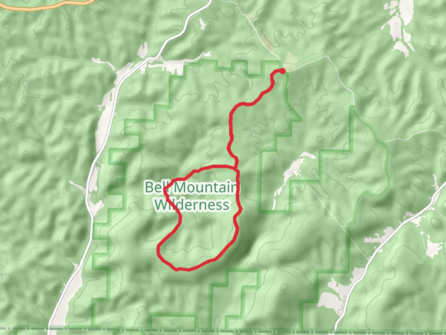 An image depicting the trail Bell Mountain Loop Trail from County Road 2228 and its surrounding area.
