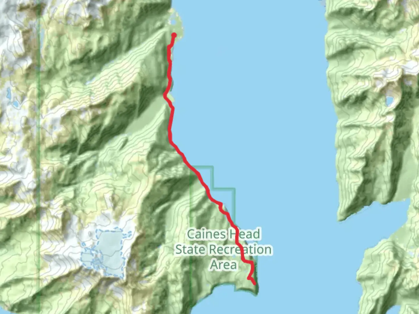 An image depicting the trail Caines Head Trail and its surrounding area.