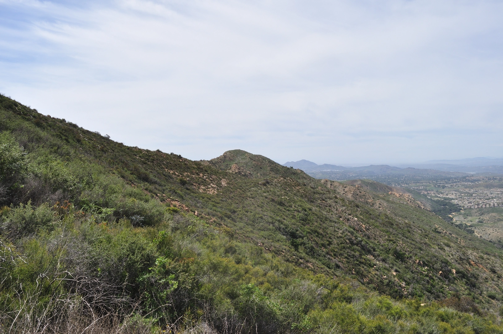 An image depicting the trail Simi Peak from Deerhill Road and its surrounding area.