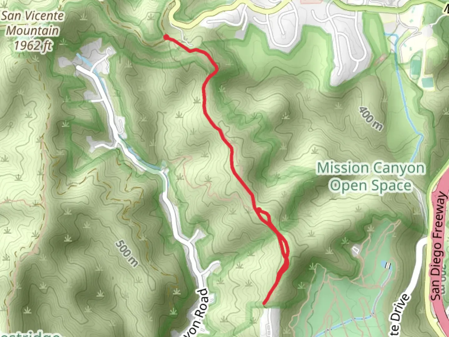 An image depicting the trail Canyonback Road and its surrounding area.