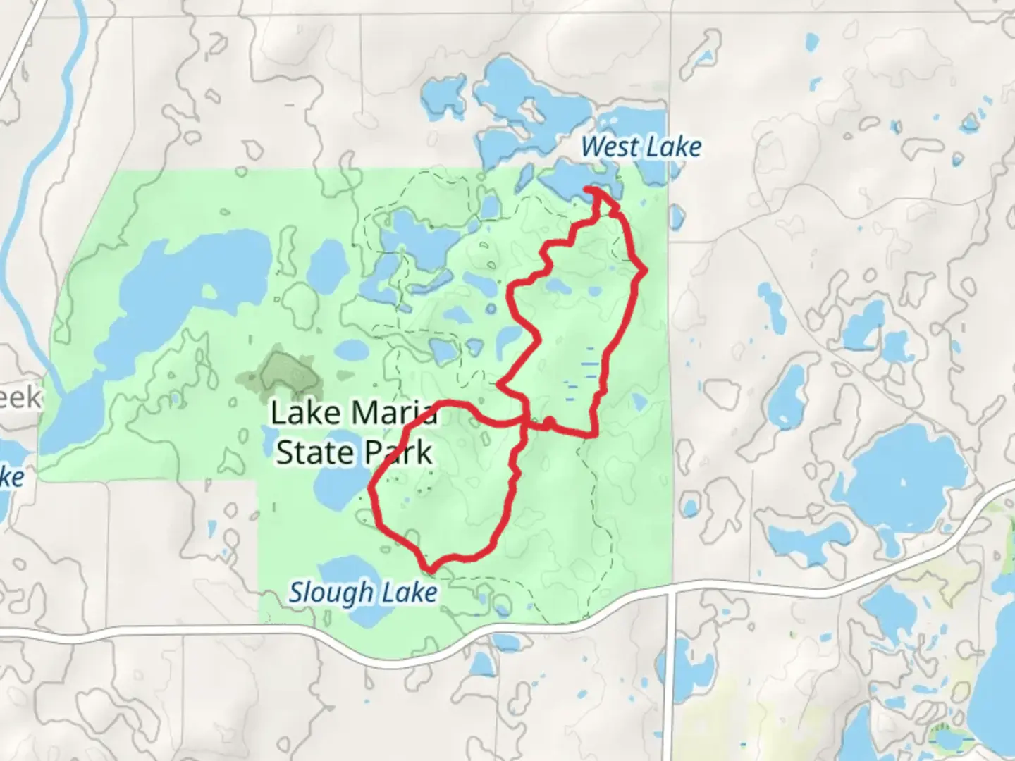 An image depicting the trail Putnam Lake via Big Woods Loop and Anderson Hill Loop and its surrounding area.