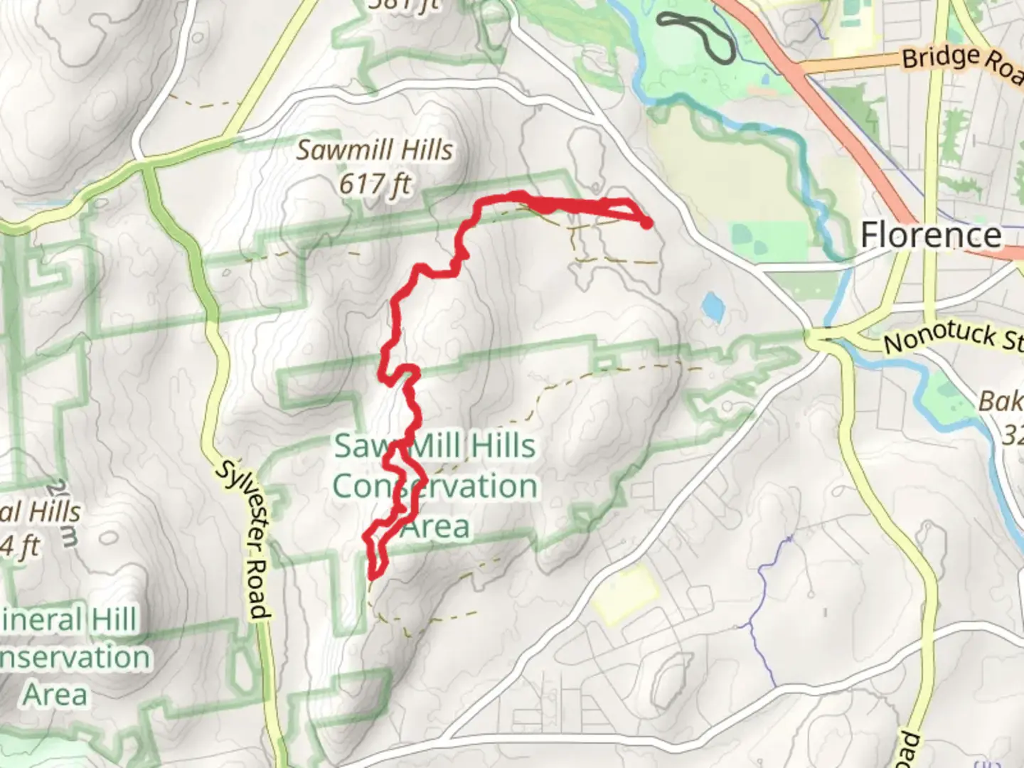 An image depicting the trail Swamill Hills Trail and its surrounding area.