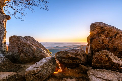 An image depicting the trail Hazel Falls and Caves Trail and its surrounding area.