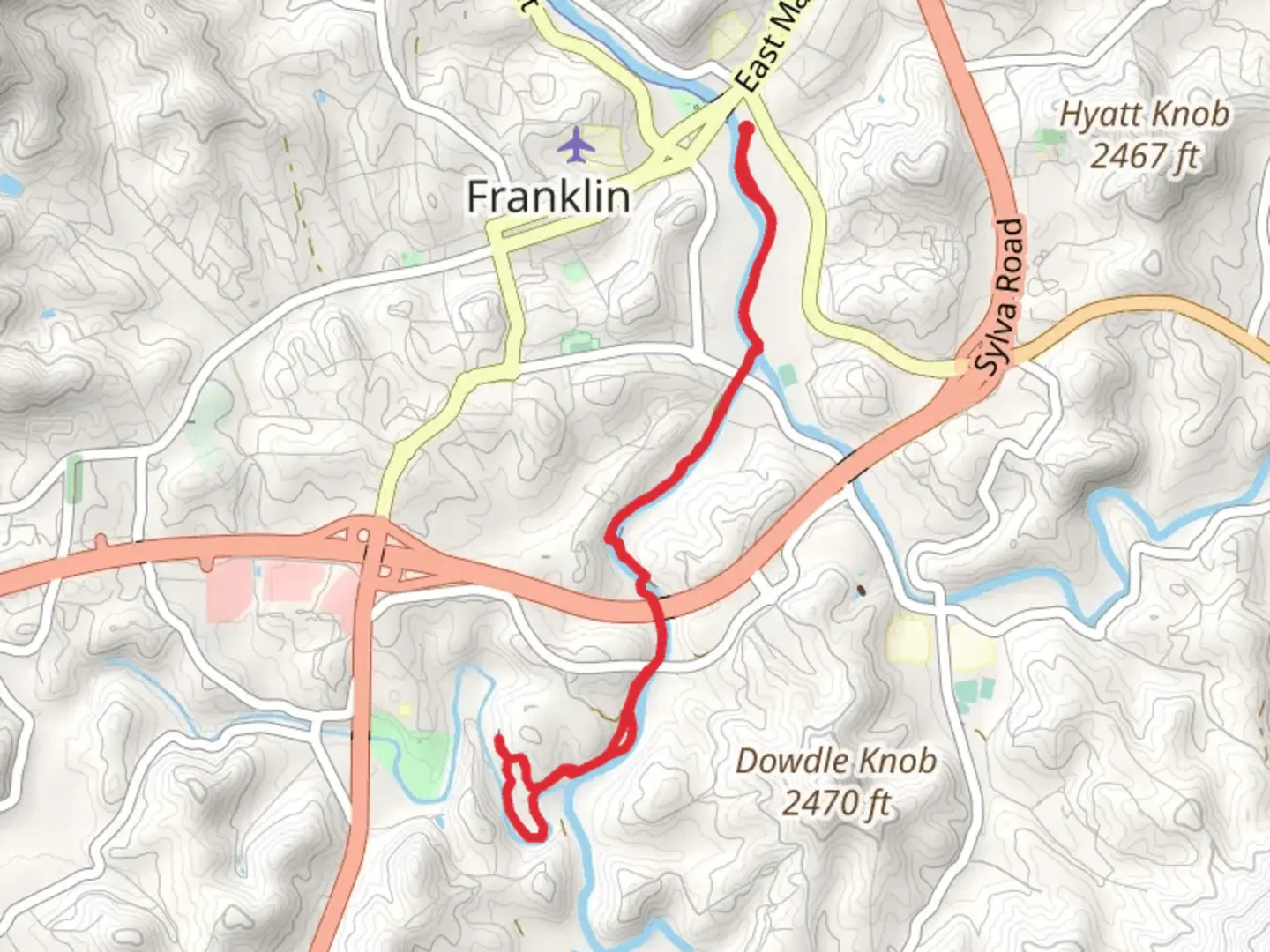 An image depicting the trail Little Tennessee River Greenway and its surrounding area.