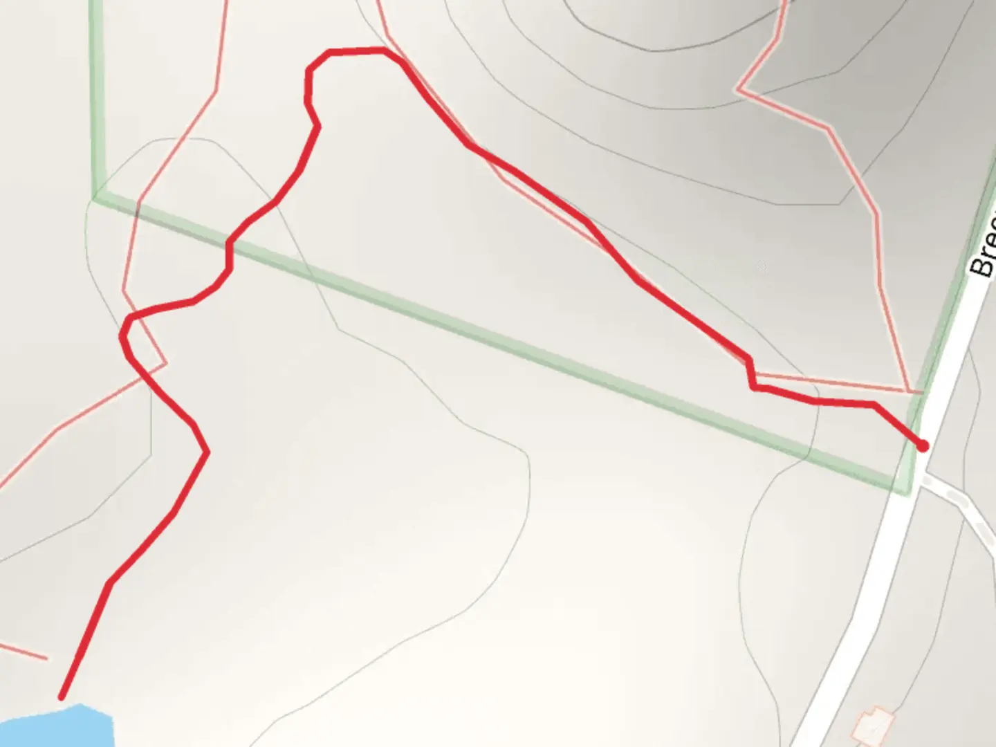 An image depicting the trail Breezemere Road - John B Mountain and its surrounding area.