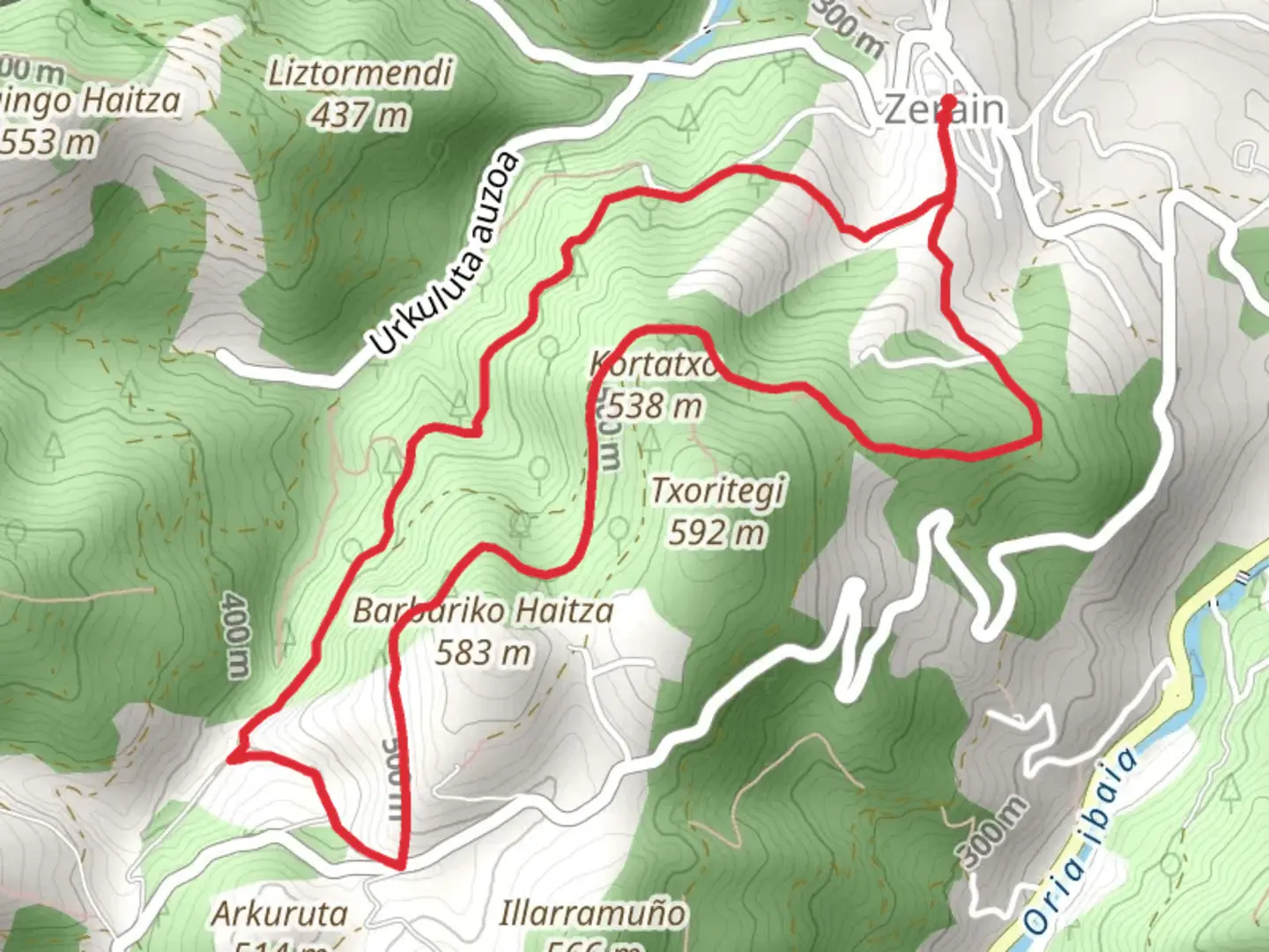 An image depicting the trail Barbari Aizikorri pastures PR GI 26 and its surrounding area.
