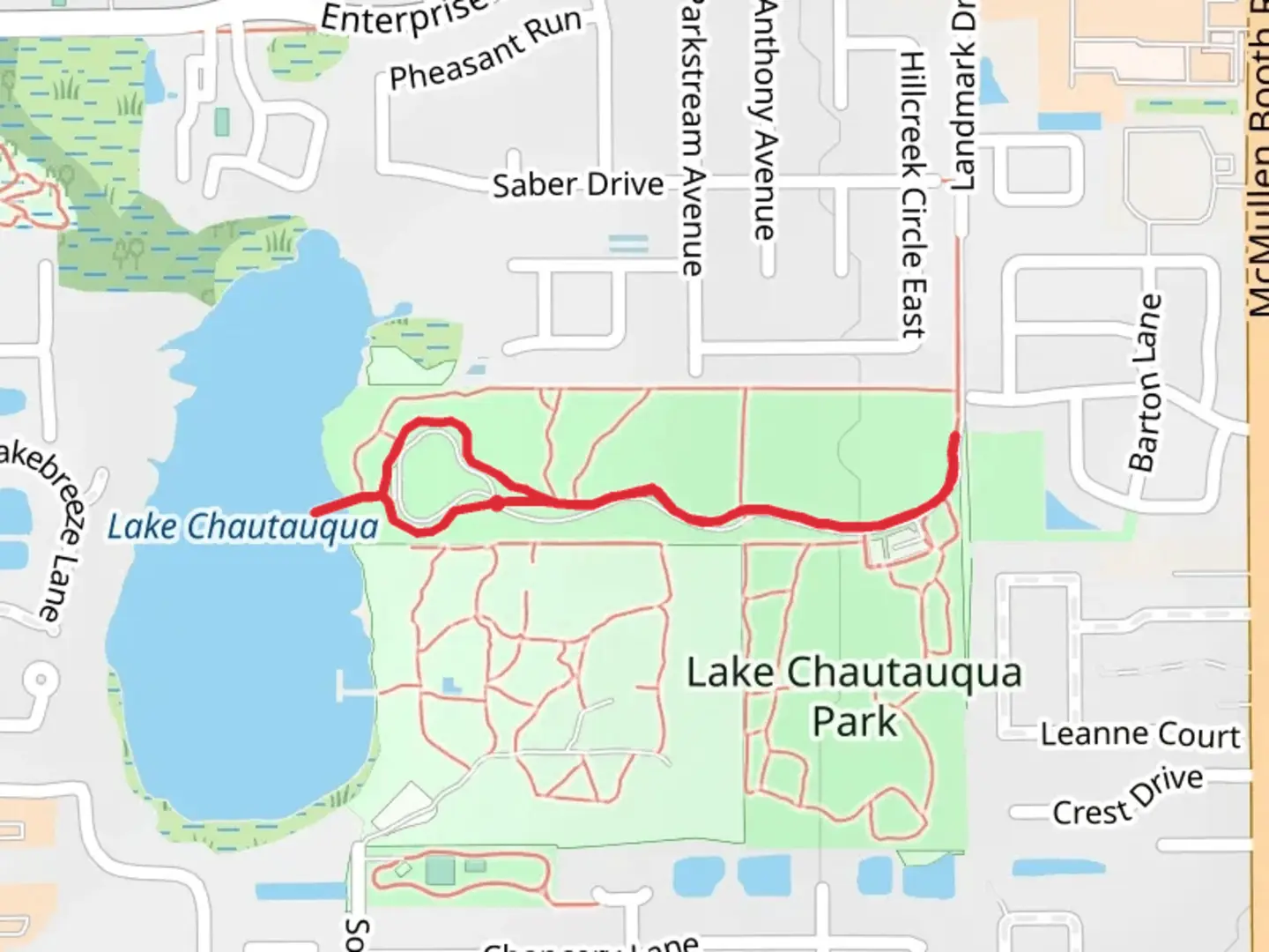 An image depicting the trail Lake Chautauqua Park Loop and its surrounding area.